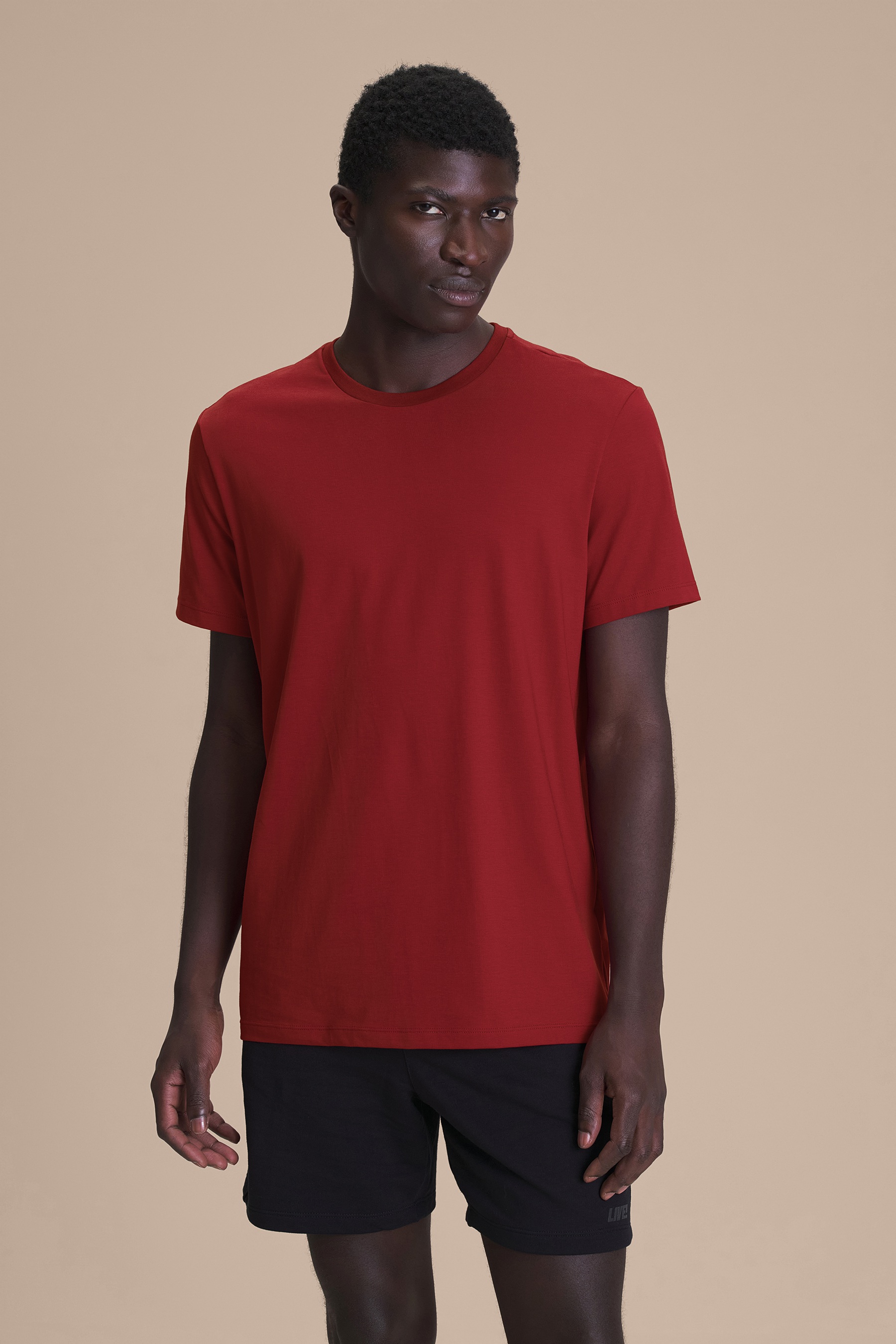 Live! — Camiseta Comfy Pima Slim Unissex